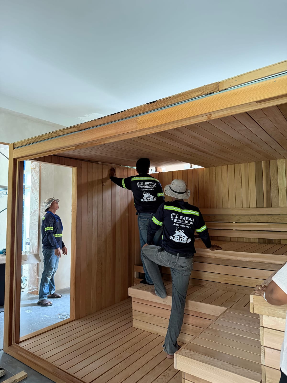 Cladding an indoor sauna on-site