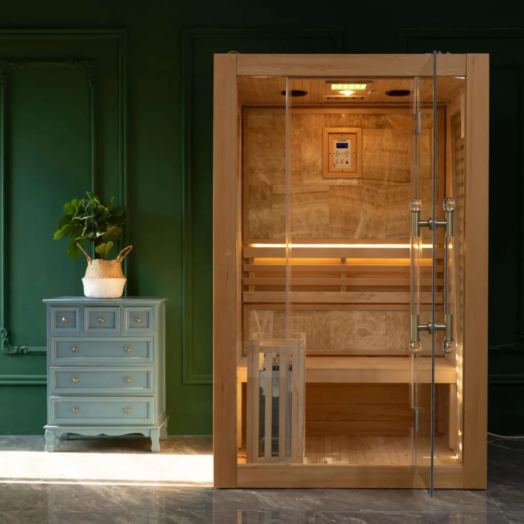 2 person sauna inside a house with dark green walls
