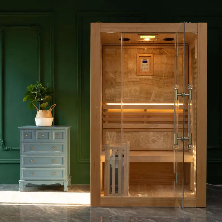 2 person sauna inside a house with dark green walls